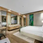 Regnum Carya Jade Room Partial Sea View Bedroom